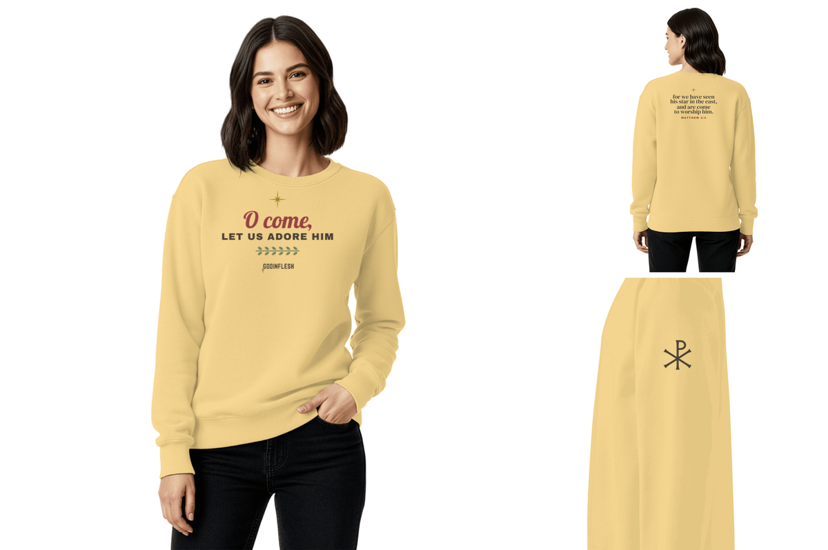 O Come Let Us Adore Him Christmas Crewneck in use, lifestyle photo with our design
