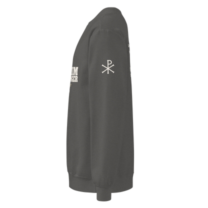 Manger Cross Western Christmas Crewneck, left sleeve mockup with the Chi-Rho